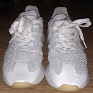 All white, gum bottoms